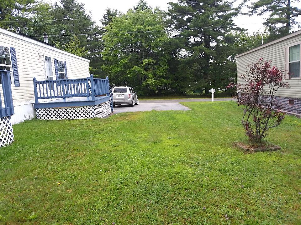 Decent lawn & paved parking!