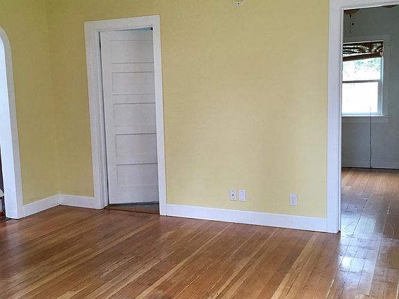 View of living room from front door entrance.