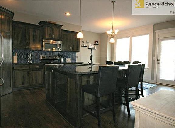 stunning open kitchen w/breakfast bar island