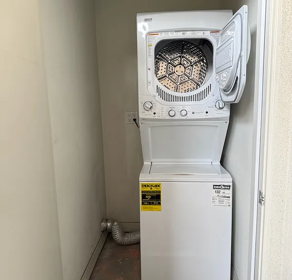 Private stacked washer and dryer