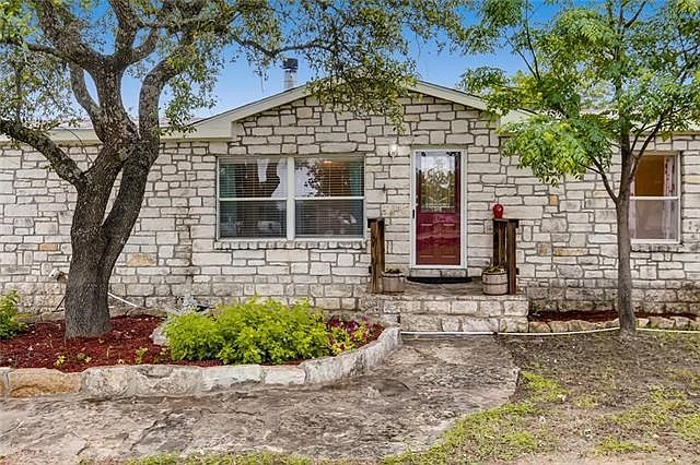 Well-loved home on 3+ acres. Owner has created this quiet oasis*