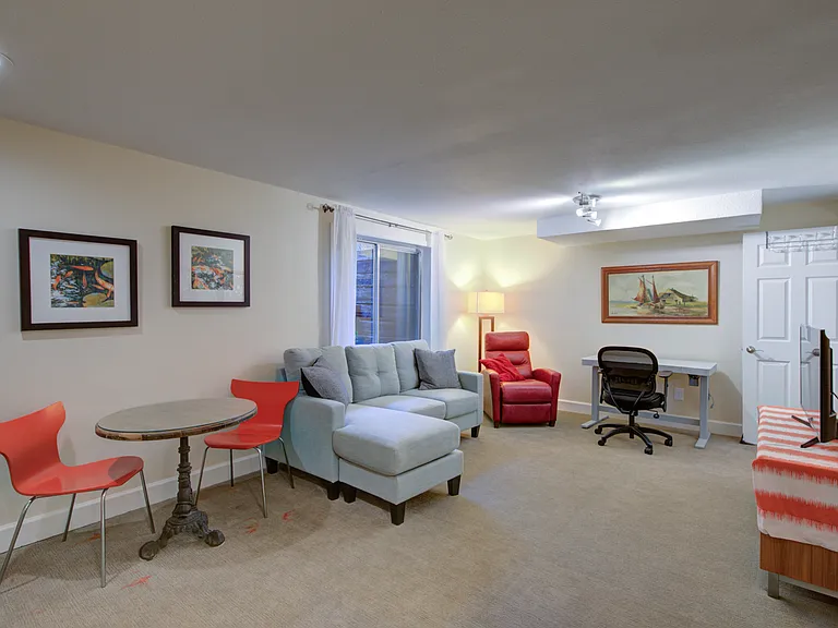 LIVING ROOM WITH EATING TABLE AND CHAIRS