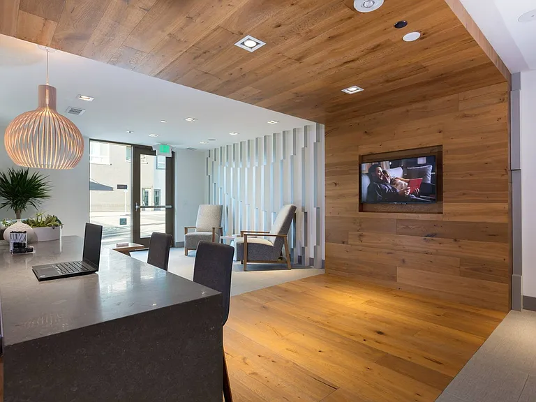 Leasing office with contemporary finishes and welcoming staff at Aster Apartments near BART.