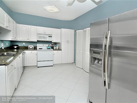 4th image of 9778 Royal Palm Blvd