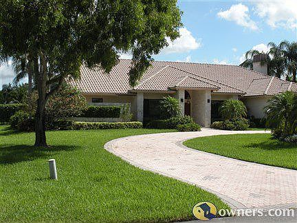 Huge circular driveway accomodates many vehicles