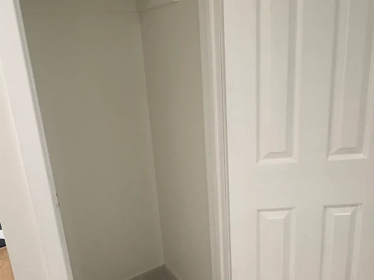 Coat closet off hallway