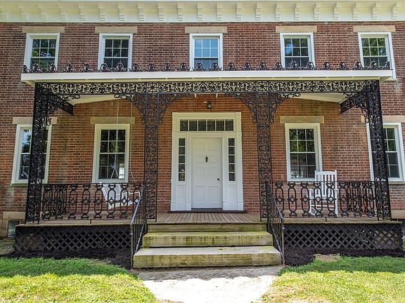 Check out this beautiful iron detail on the front porch!