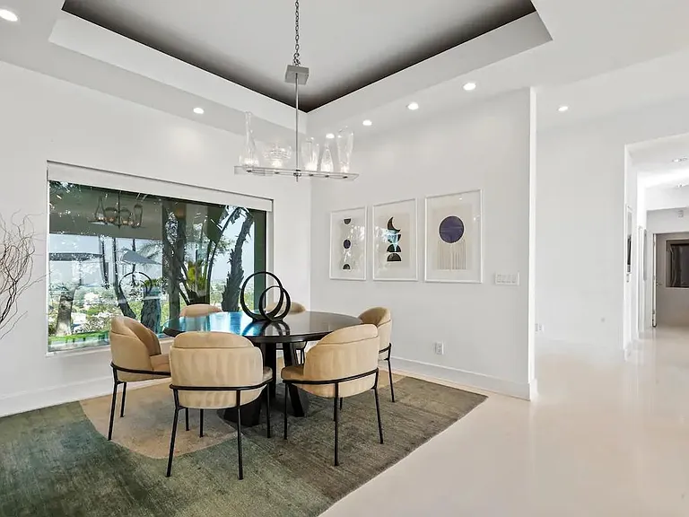 The Dining Room is perfectly designed to seat six people, offering a cozy and stylish space for shared meals and cherished memories.