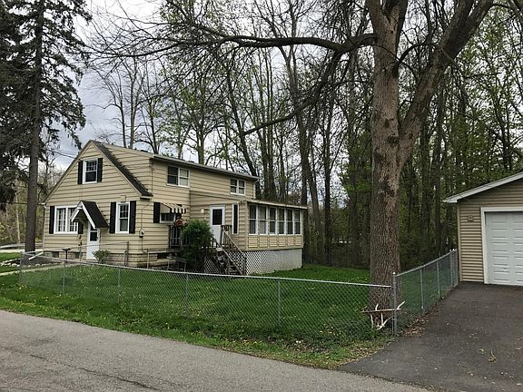 Fenced yard, oversized two car new garage plus off street pa
