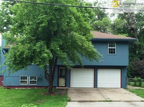 Front of House with Pear Tree