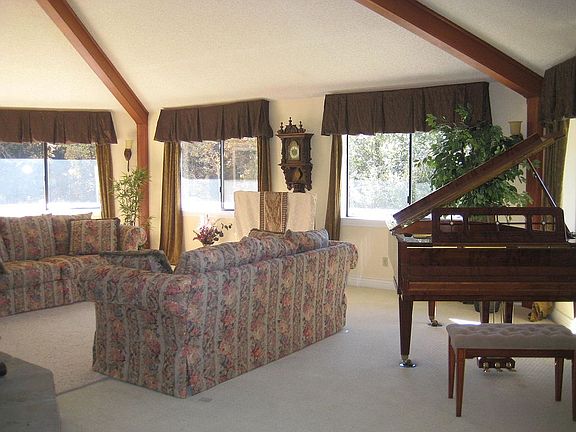 Living Room has panoramic views, vaulted ceiling