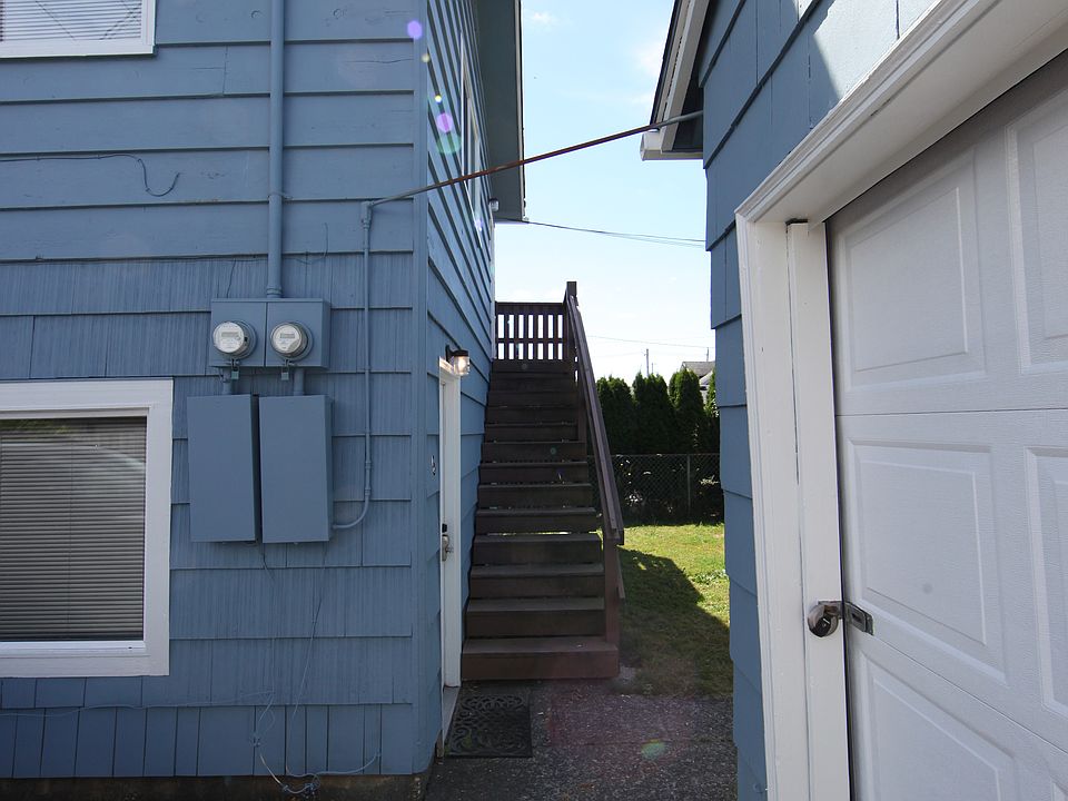 Unit 5 entrance and stairs to unit 6 (view from parking area)