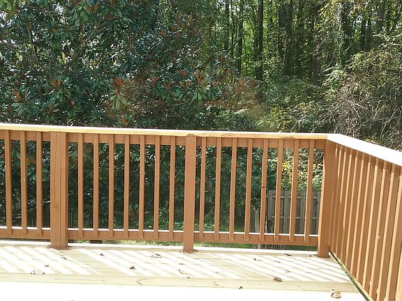 new decking, yard backs to woods