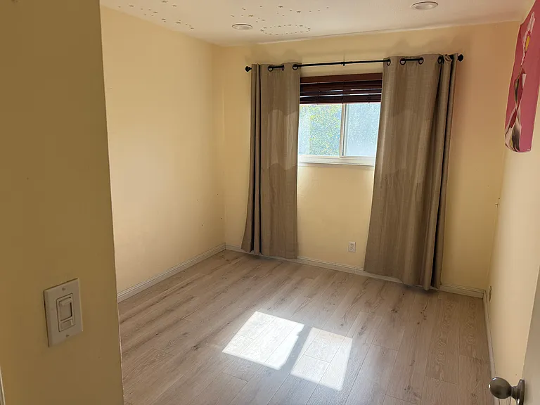 Bedroom 3 with new wooden flooring