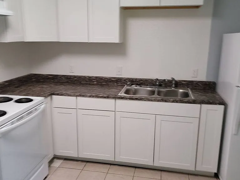 Swiss Village Apartments — Photo 14