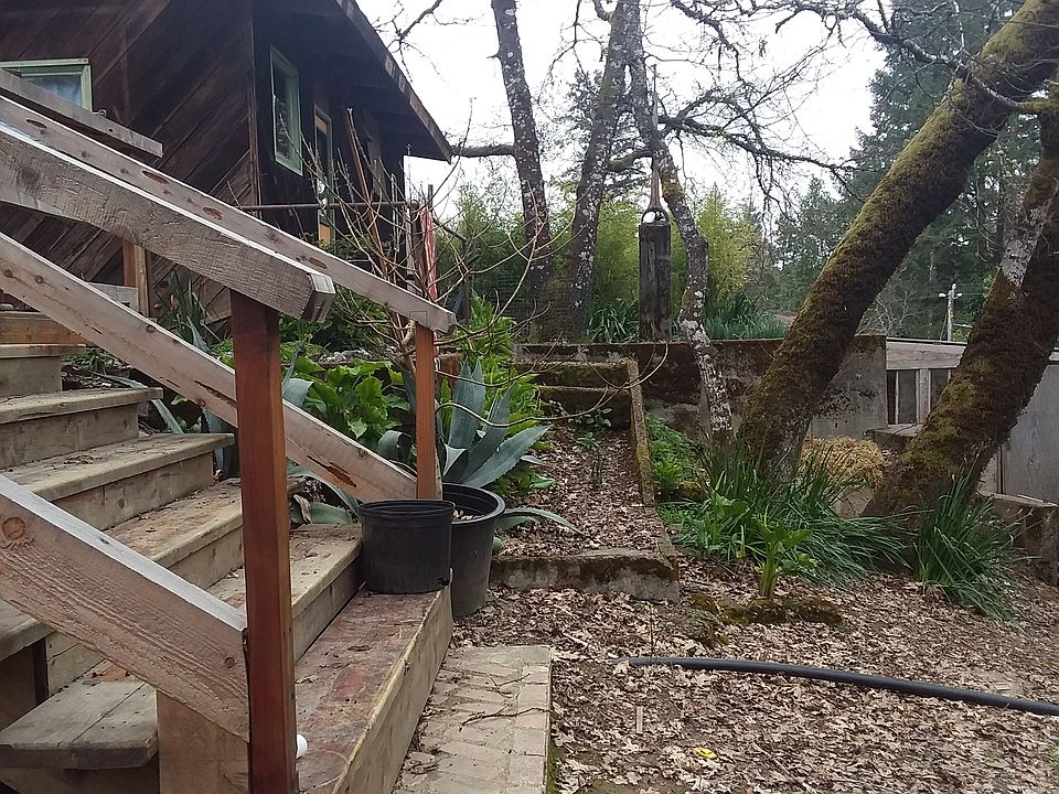 Outbuilding and deck stairs