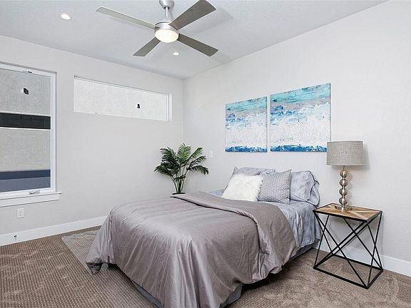 Master bedroom with two walk in closets