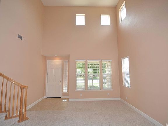 Formal living room with high ceiling