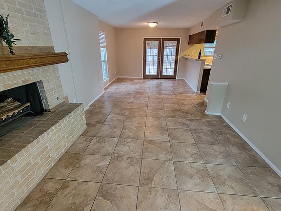 Living room and dining area towards the backyard