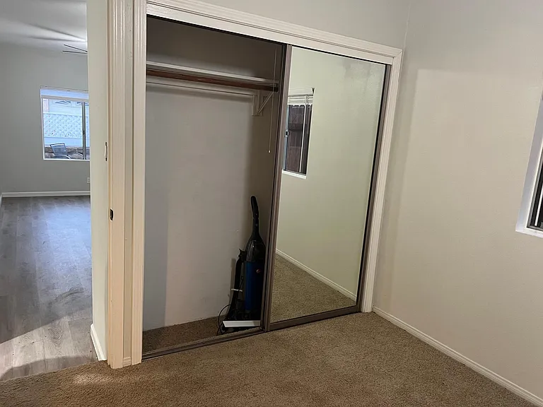 Mirrored closet for bedroom.