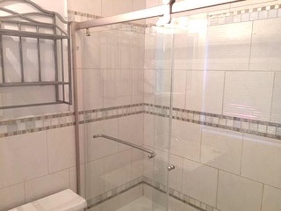 upper level, bath with glass door enclosure