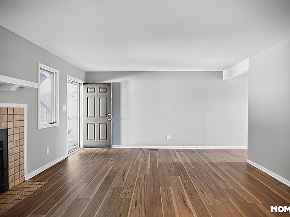 Large living room with tons of natural light.