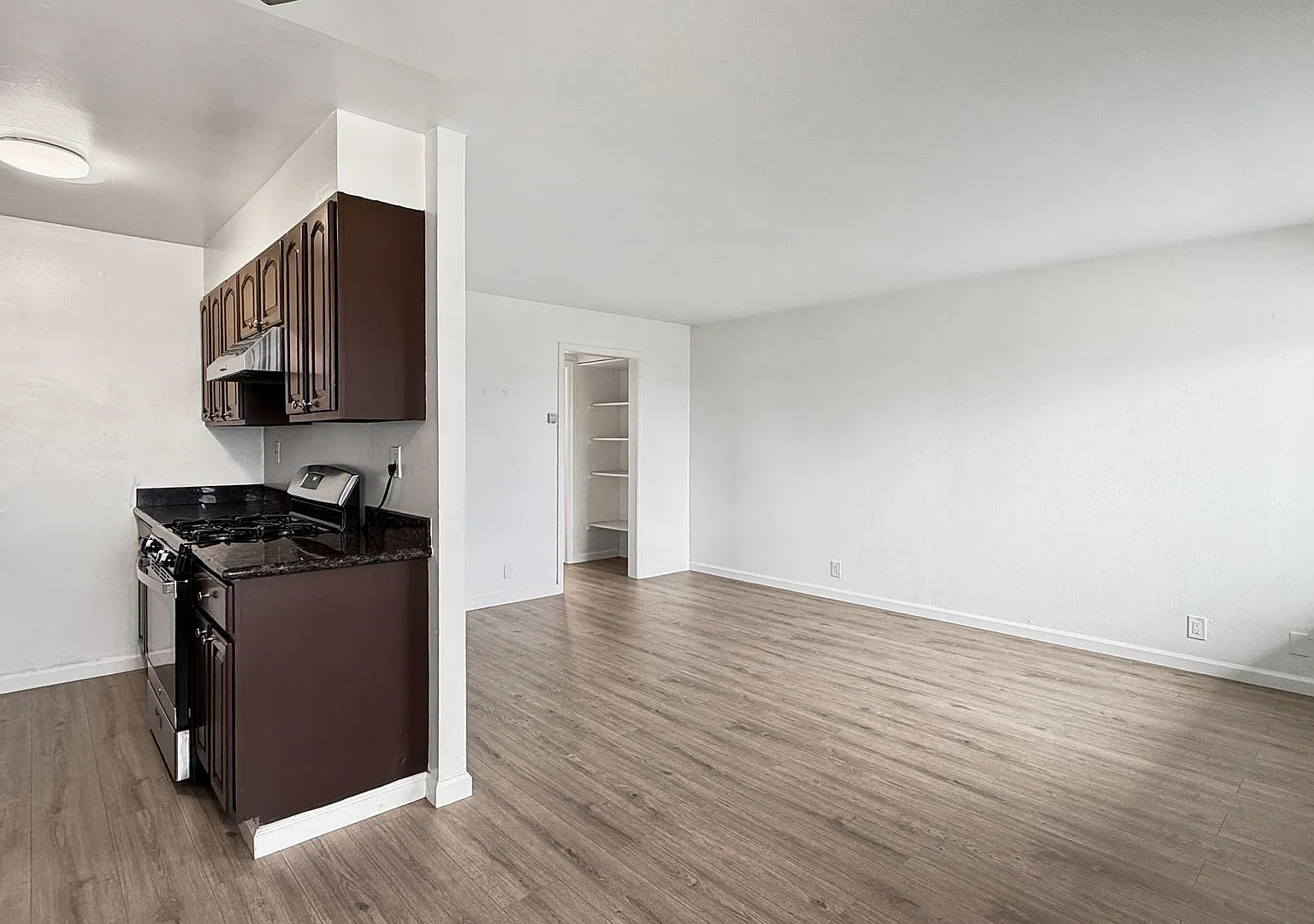 First month FREE! Fantastic Top-Floor Apartment in an Extremely Well-Maintained Gated Building — Photo 2