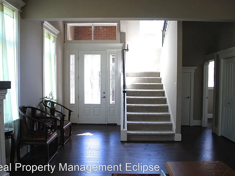 From living room facing the entrance. The stair is to the 2nd floor.