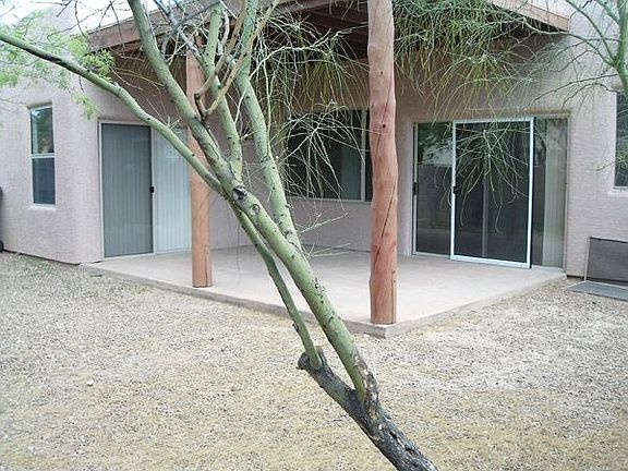 Covered patio in back yard