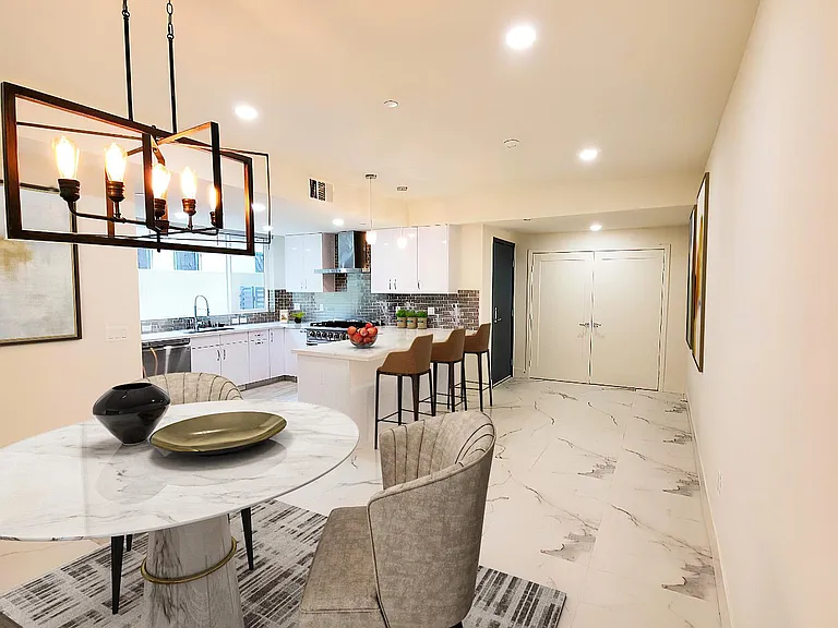 Dining looking to kitchen virtually staged