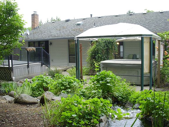 Backyard facing backside of home