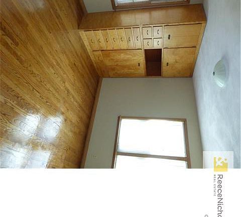 Bedroom with Hardwoods and Built Ins