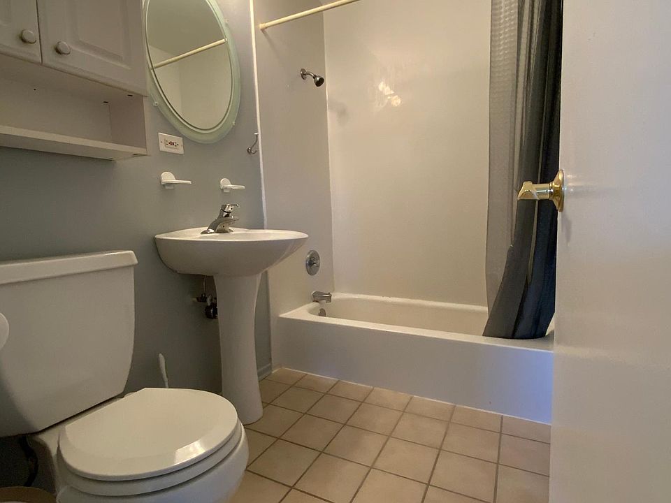 Bathroom - Never worry about running out of hot water and enjoy great water pressure! Each unit has its own water system and individual water heater. Updated bathroom fan is quiet, quick, and powerful with additional overhead lighting.