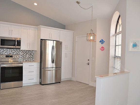 2nd image of 7608 Lexington Club Blvd APT A