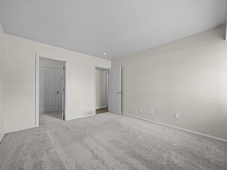 Large bedroom at Three Oaks Apartments in Troy, MI