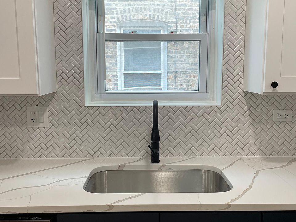 Decorative light fixture above sink
