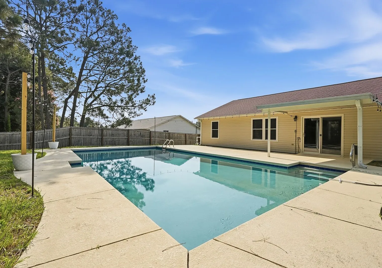 Your Own Backyard Oasis 3 Bedroom Pool Home in South Crestview! — Photo 1