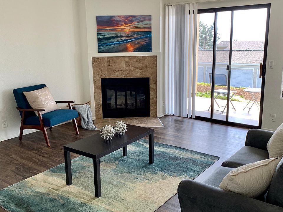 Living Room with Wood Burning Fireplace