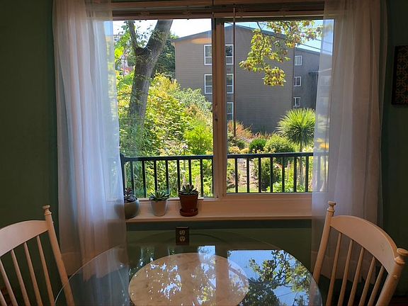 This dining window photo is from another, similar, top floor apartment.