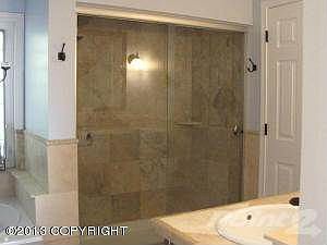Custom tiled large shower master bath