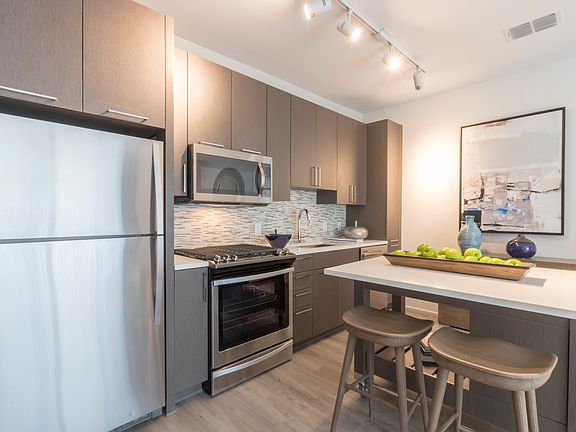Modern lighting and stainless steel appliances