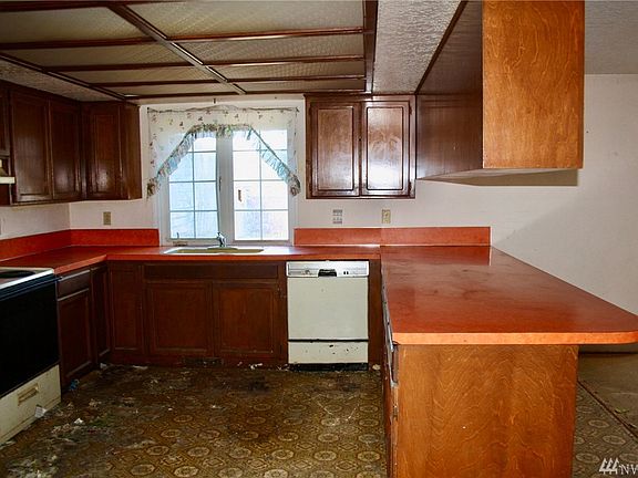 The kitchen as viewed from the dining room. Great area for bar stools as well. 