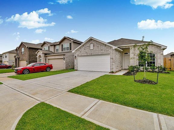 Park your cars in double garage and large driveway.