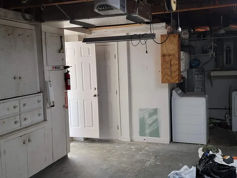 Single car garage with ample storage. Laundry room, and 2nd bathroom