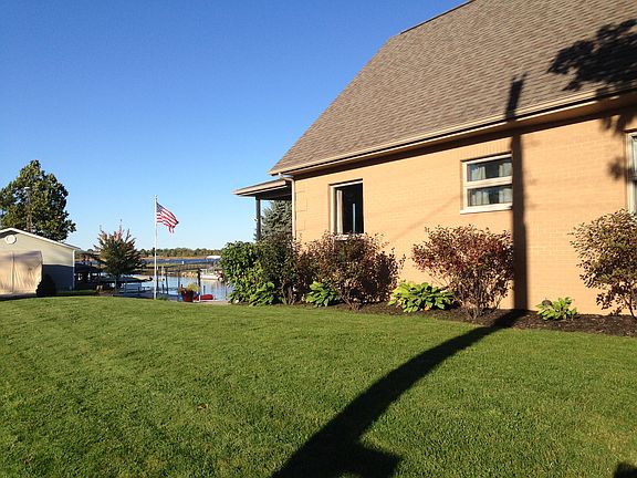 Side view of home. Extra lot