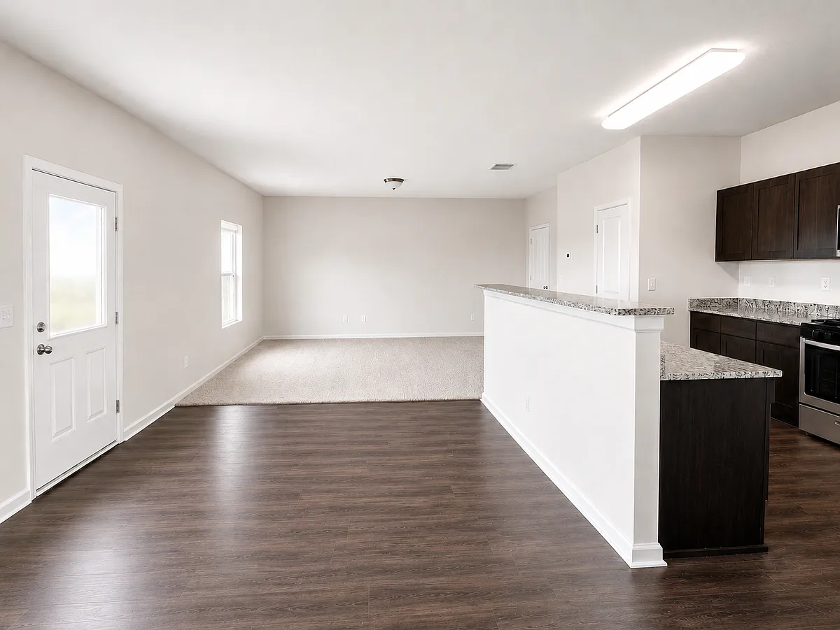 Kitchen with dark wood flooring, range, light stone countertops, and appliances with stainless steel finishes - 674 Independence Ave