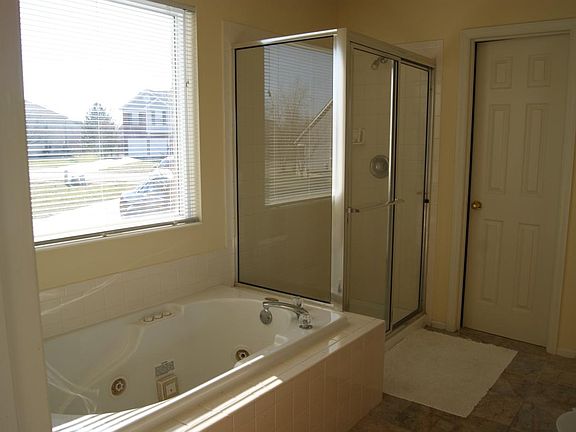 master bath with jetted tub
