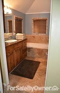Master Bath
						:
						Jetted tub with separate slate multi-head shower