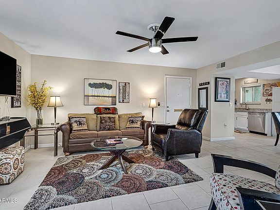 Comfy Great Room leather recliner, 2 lounge chairs, sofa w 55" TV.