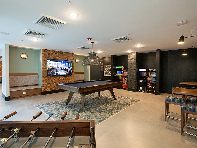 Gaming Lounge with Billiards, Foosball, and Vintage Arcade Games